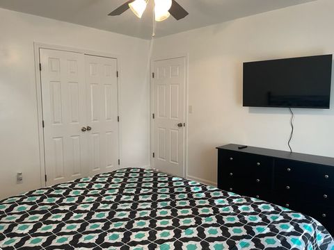 Watch TV in bed while luxuriating in the master bed