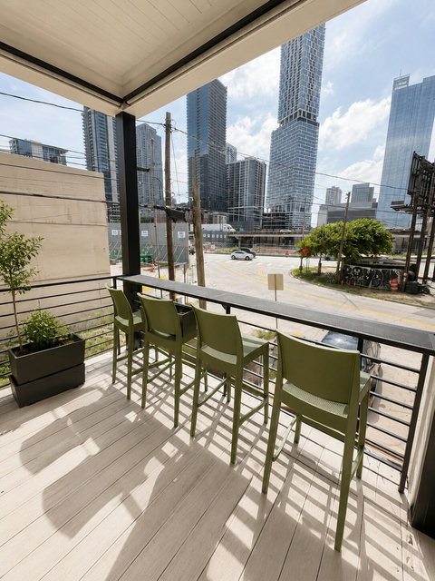 Open the sliding doors and enjoy seamless indoor-outdoor living. Dine outside, sip a drink at the bar, or simply soak up the downtown views.