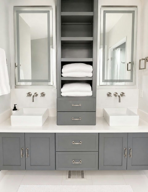 The spacious primary bathroom features a double vanity, oversized walk-in shower, and an open layout that flows seamlessly from the primary bedroom for a bright, luxurious feel.