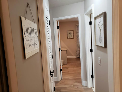 View of turning the corner to the bedrooms from the dining area.
