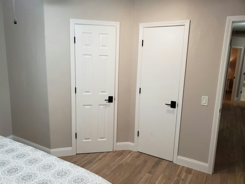 Left door goes into master bathroom and right door goes into a nice large walk in master closet. This is where we keep the ironing board and iron and vaccum.