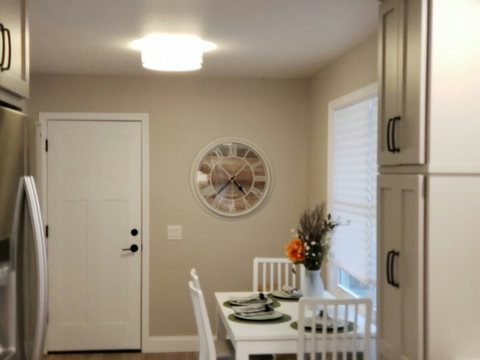 We love our big clock. Also another different angle of dining area and pantry