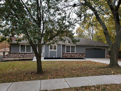 We love the front of the house with the new siding and new windows. I think we have the cutest house on the street.