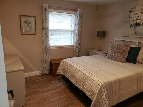 Another angle of the queen bed area.