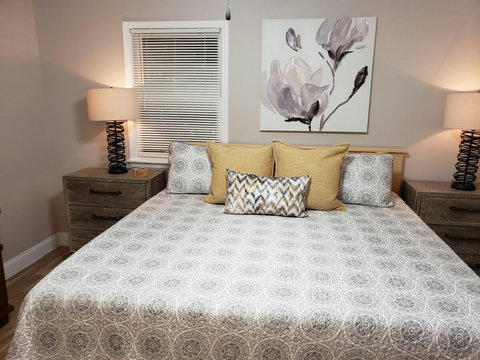 View of our mater bedroom that has a nice comfy king bed with large night stands.