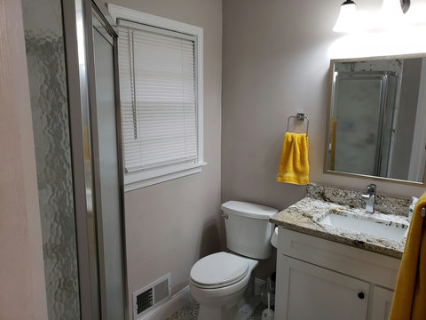 Another angle of master bathroom that has a walk in shower.