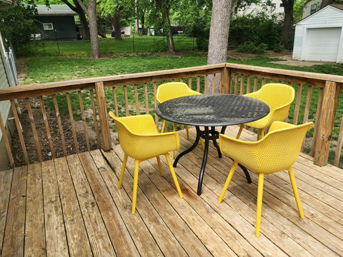 Just the right size  patio table and chairs on the large deck to sit on during the nice spring and summer days.