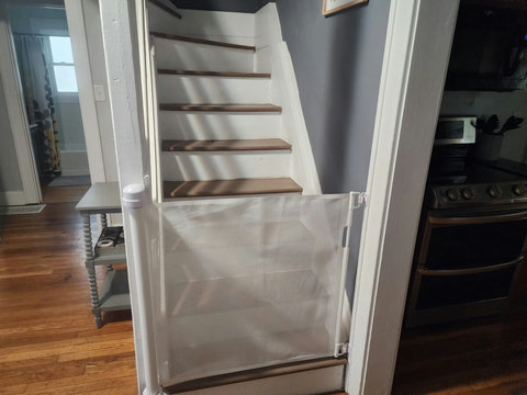 Easy child gate to prevent children and or pets from going upstairs to the office.