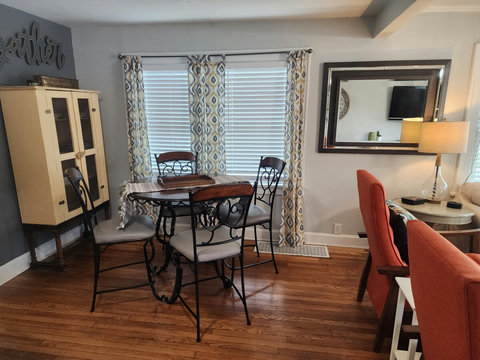 Really comfortable counter chairs around dining table. Easily bring food from kitchen to enjoy your meals and even watch tv if wanting. Or can set up laptop to work if wanting to instead of upstairs.