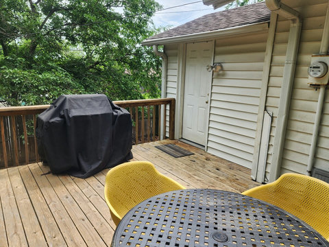 Picture of patio table and chairs with a weber grill. That is the only grill that we have in our homes.