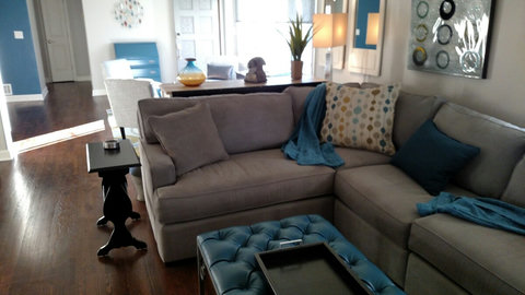 Close view of sectional and metal ottoman