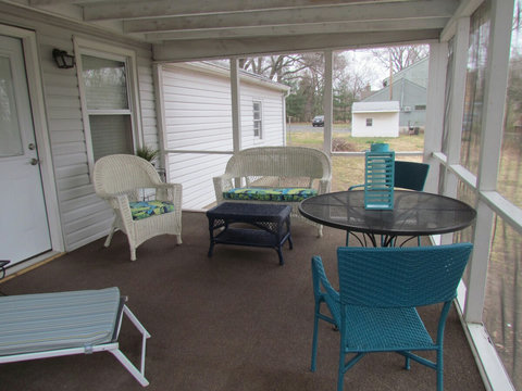 Comfortable screened in porch.
