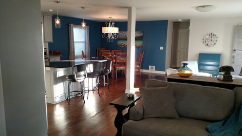 Partial view from seating area of kitchen and dining room.