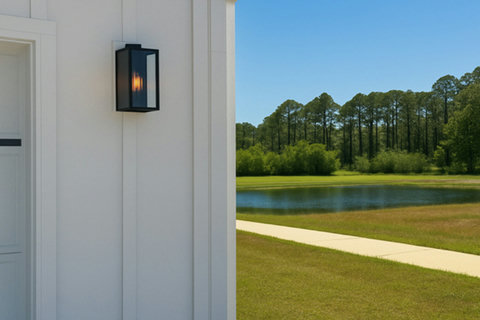 Modern exterior lantern with pond beyond