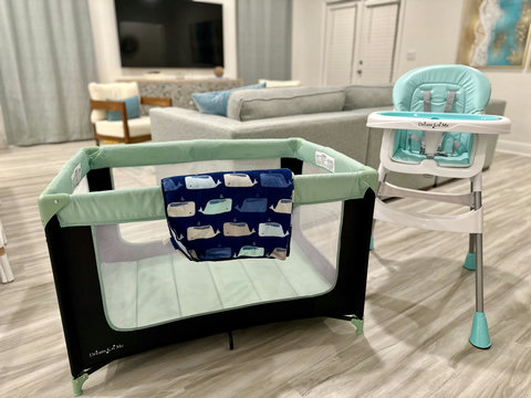 Pack-and-play and high chair for little guests