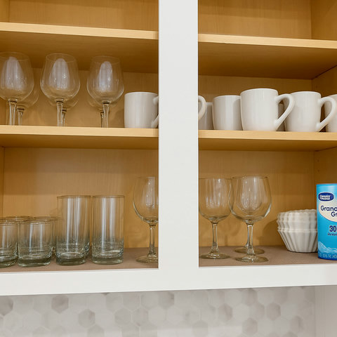 Glassware and mugs ready for morning coffee