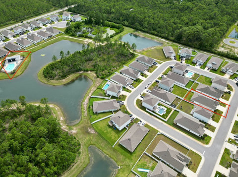Aerial view of home near community pool
