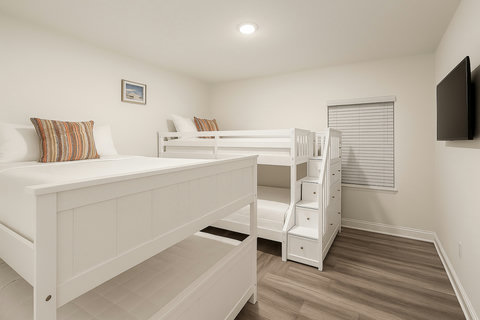 Queen bed and bunks with built-in stairs