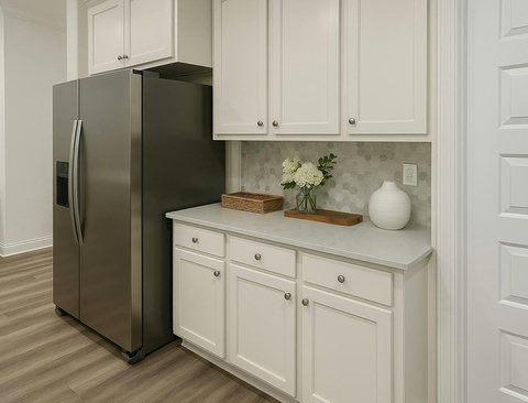Stainless fridge and stylish kitchen countertop