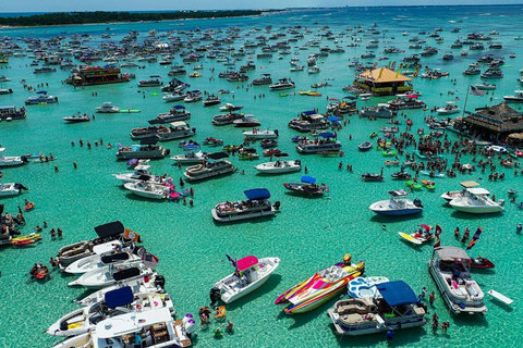 Lively Destin sandbar with boats and turquoise water