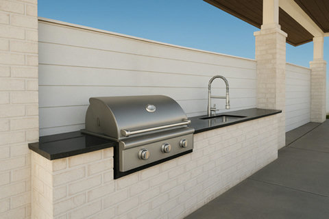 Outdoor grill station with sink on the patio