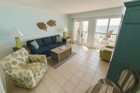 Coastal living room with gulf views and balcony