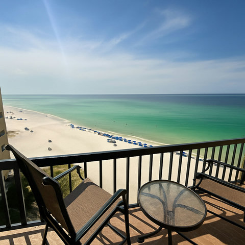 Private balcony overlooking emerald Gulf waters
