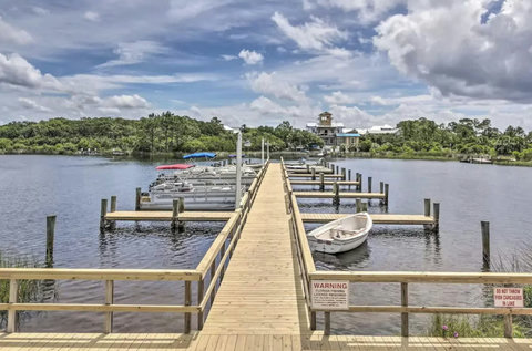 Community pier with pontoon slips and calm lake