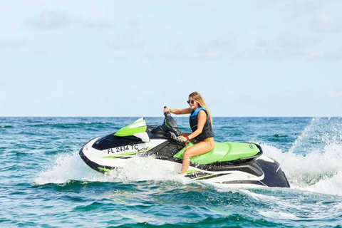Jet skiing across open emerald Gulf waters