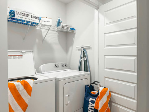 In-home laundry with washer, dryer, and ironing board
