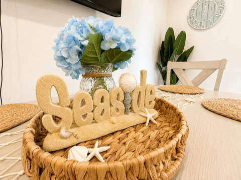 Coastal Seaside centerpiece with blue hydrangeas