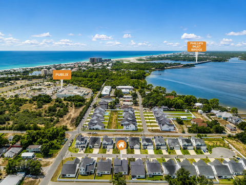 Location – Aerial view showcasing the neighborhood's proximity to the beach and bay.