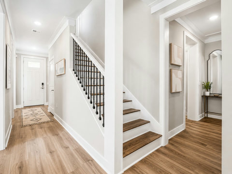 Entryway – Welcoming foyer with the front entrance and a staircase leading to the upper level.