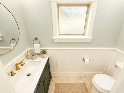 Relax and soak in the deep tub of this bright, well-appointed bathroom.