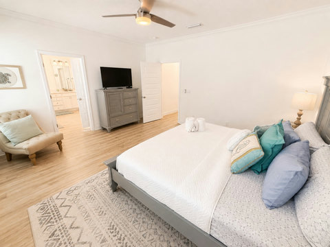 Wake up refreshed in this light-filled bedroom, complete with a smart TV and an ensuite just steps away.
