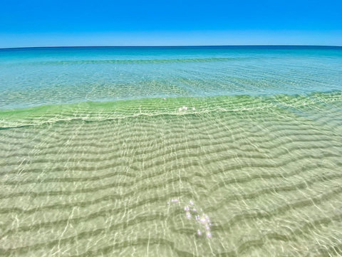 Endless emerald water meeting blue sky—just a short trip to some of the most beautiful beaches on the Gulf Coast.