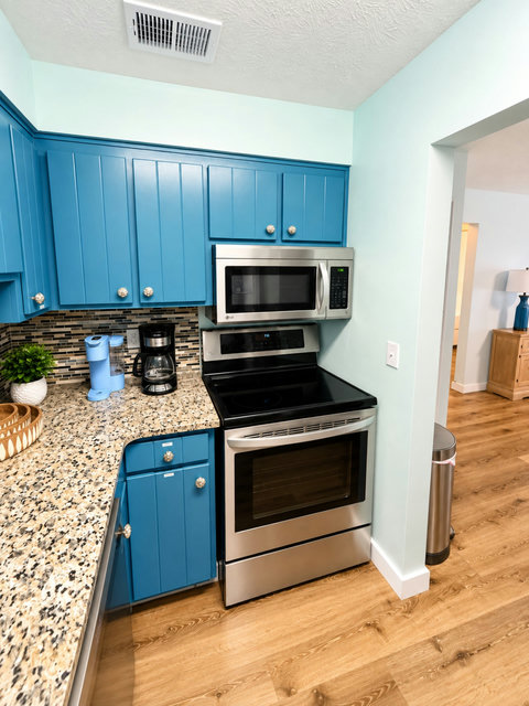 Fully equipped kitchen with stainless appliances