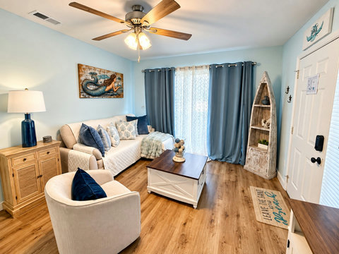 Cozy living room sofa and swivel chair