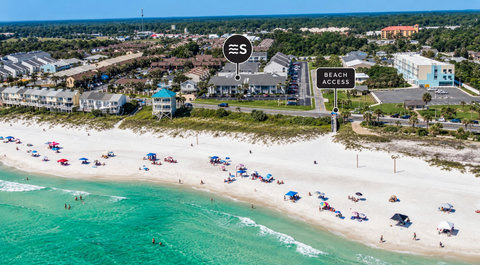 Steps to white sand and emerald Gulf waters