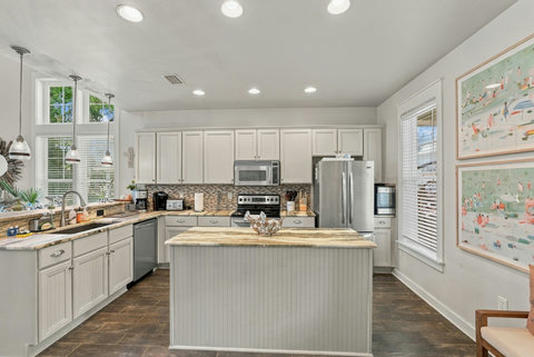 Kitchen with island and stainless appliances
