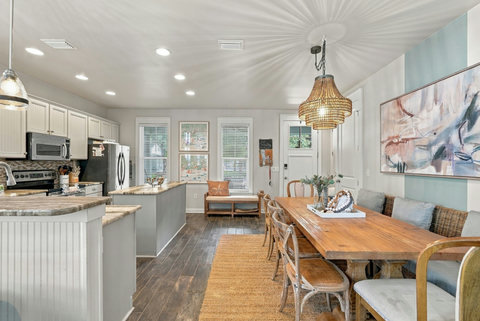 Dining table under woven pendant light