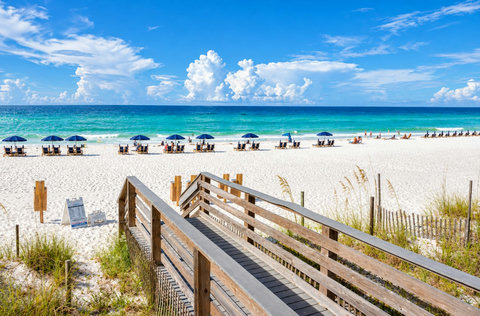 Boardwalk to white-sand beach