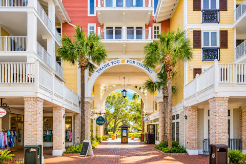 Sunny Coastal Shopping Village Entrance