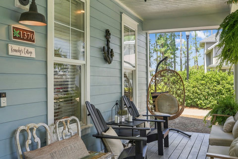 Porch seating with Adirondack chairs and egg chair