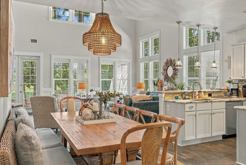 Dining table with bench seating next to the kitchen