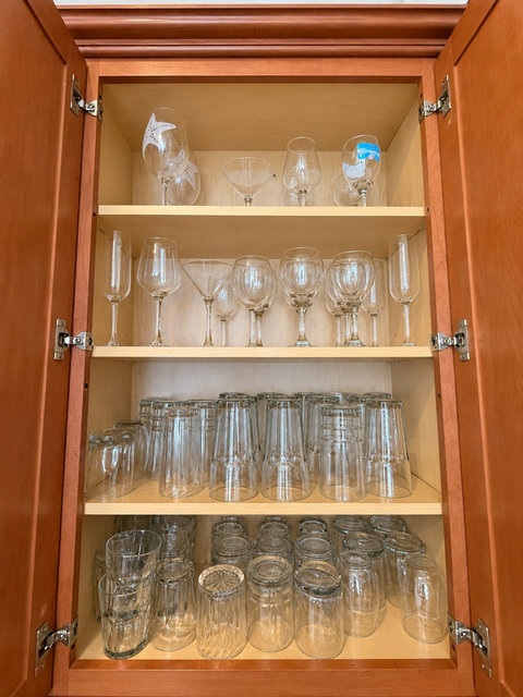 Plenty of glassware, including wine glasses