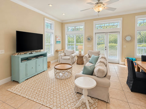 Living room with cozy seating and Smart TV