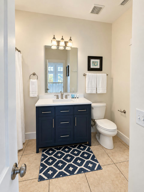 Bathroom with navy vanity