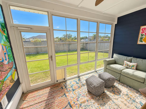 Lanai overlooking the fenced backyard