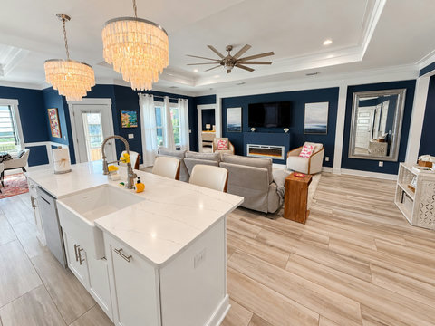 Farmhouse-sink island overlooking the living room
